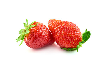 Wall Mural - Two strawberry berries isolated on white background.