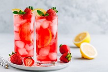 Refreshing Strawberry Mint And Lemon Iced Tea Or Lemonade In Glasses