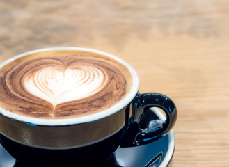 Black Coffee cup on wood table