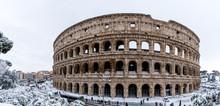 The Roman Colosseum After A Winder Snowfall In Rome, Italy.