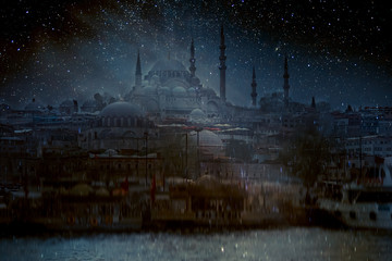 Blue mosque (Sultan Ahmed Mosque) at night, under the starry sky. Elements of this image furnished by NASA.