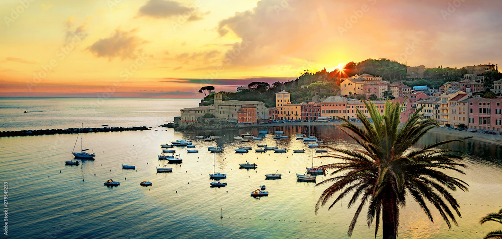 Silence bay and seaside of small resort town Sestri Levante at sunset. Genova Province, Liguria, Italy - obrazy, fototapety, plakaty 