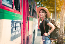 Young Asian Beautiful Woman Is Using The Bus In Bangkok, Thailand.