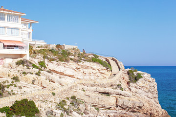 Wall Mural - Summer tropical resort. Beautiful vivid mediterranean seashore. Salou Platja Capellans Beach, Spain.