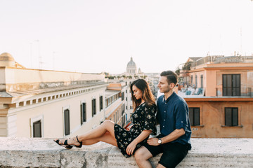 Wedding photography in Italy. Couple walking the streets of Rome, sightseeing and panoramic views.