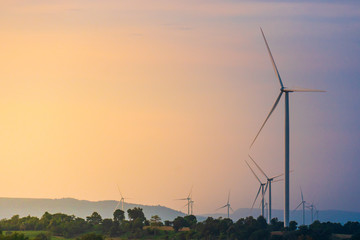 Wall Mural - Green energy concept, eco power. Wind turbine Located along the hill With the wind blowing all the time. Can produce renewable energy as well. Considered a clean energy.