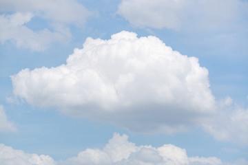 white clouds on a blue sky background