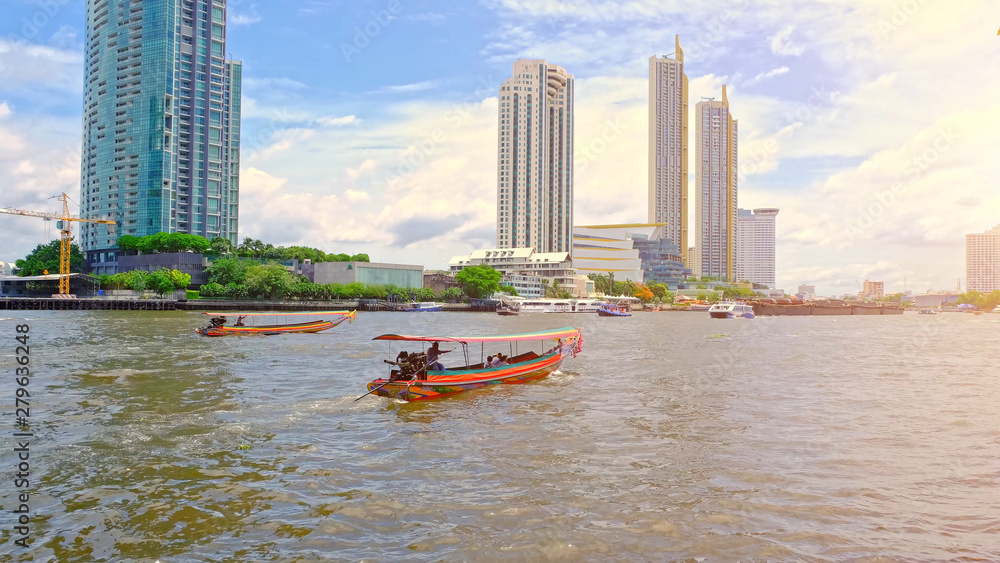 Boat traffic in the Chao Phraya River in the city center, Bangkok city ...