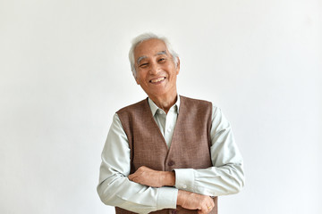 Asian senior old man, Confident and smiling elderly people with folded arms gesture on white background, Happy retiree citizen concept.