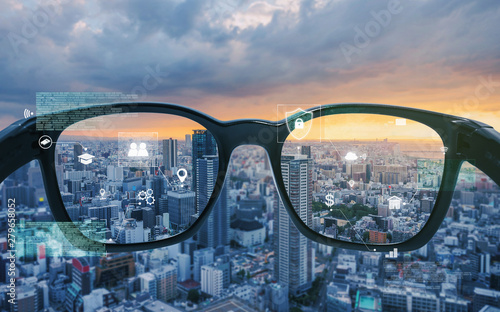Smart Glasses Vr Virtual Reality And Ar Augmented Reality Technology Smart Glasses Looking At The City With Graphic Hologram Kaufen Sie Dieses Foto Und Finden Sie Ahnliche Bilder Auf Adobe Stock
