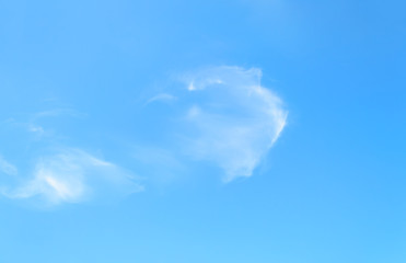 Wall Mural - light white translucent cirrus cloud high in the blue summer sky. different cloud types and atmosphe