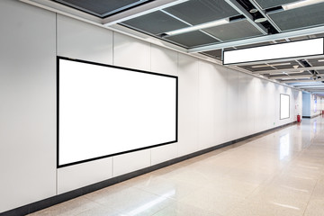 Blank advertising display in subway station underpass public area