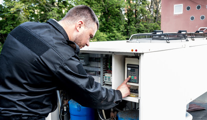 Ventilation cleaning. Specialist at work. Repair ventilation system (HVAC)