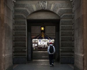 man walking in corridor