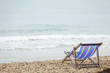 © Golden House Images - Beach chair on white sand with sea wave and sunny. Relaxing on the beach.