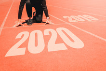 2020 Newyear , Athlete Woman Starting On Line For Start Running With Number 2020 Start To New Year.