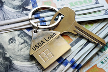 Key And Metal Shape Of Home With Sign USDA Loan.