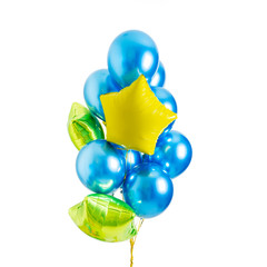 Set of blue and yellow, green foil helium balloons in form of stars on isolated white background with copy space. Concept of holiday, happy birthday.