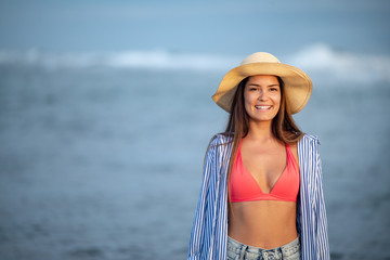 Wall Mural - Summer portrait of sexy sensual woman posing in bikini