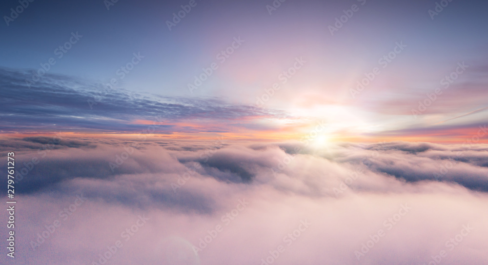 Sunset sky with beautiful clouds from the airplane window - obrazy, fototapety, plakaty 