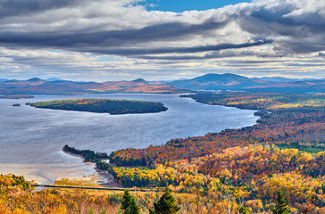 Wall Mural - Mooselookmeguntic Lake at autumn view from Height of the Land viewpoint, Maine, USA.