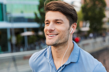 Poster - Handsome young man dressed casually spending time outdoors