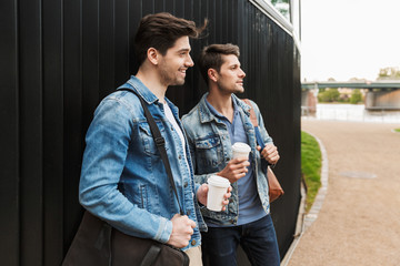 Sticker - Two smiling young men friends dressed casually