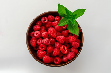 freshness raspberries over white background organic raspberry