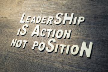 Wall Mural - Leadership Quote Concept on Wood Wall