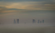 © Preju - A foggy morning and Manama City, Bahrain
