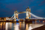 Fototapeta Londyn - Illuminated Tower Bridge right after the sunset