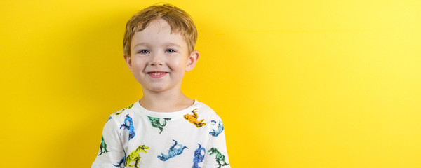 adorable small three years old boy with cute face expression