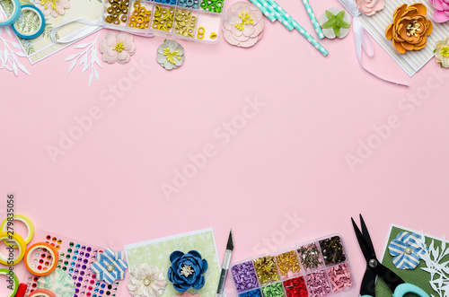 Fotografía Paper flowers, tools, paper and scrapbooking items on pink background