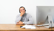 © luismolinero - Telemarketer Colombian man covering mouth with hands