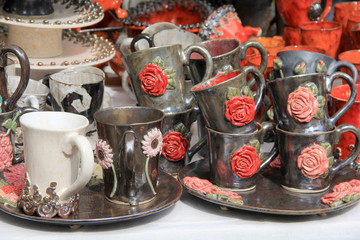 Wall Mural - Homemade ceramic cups with patterns on the table