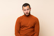 © luismolinero - Colombian man with turtleneck sweater with sad and depressed expression