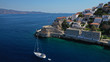© aerial-drone - Aerial drone photo of picturesque port and main village of Hydra or Ydra island with beautiful neoclassic houses, Saronic gulf, Greece
