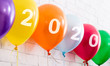 © Prostock-studio - Close up of bright colors balloons with white text