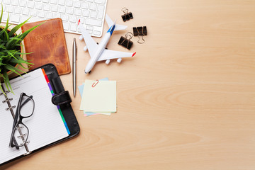 Business trip concept. Accessories on desk table