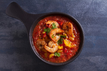 Shrimp Gazpacho with Roasted Red and Yellow Bell Peppers. Spanish soup. View from above, top studio shot