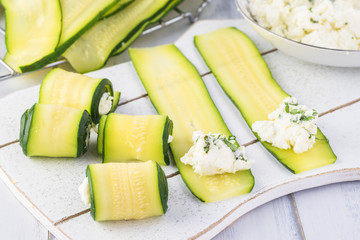 Wall Mural - Zucchini rollups with cheese in marinara sauce.