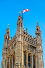 United Kingdom, England, London. Union Jack Flag Flown Above Victoria Tower, Palace Of Westminster, The Houses Of Parliament Of The United Kingdom.