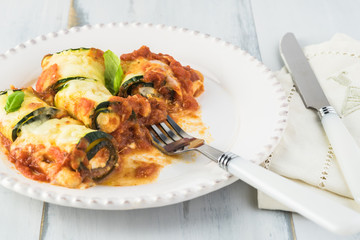 Wall Mural - Zucchini rollups with cheese in marinara sauce.