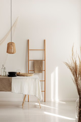 Wall Mural - wooden ladder in the center of minimal living room