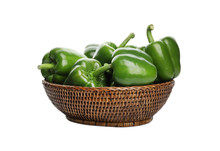 Wicker Bowl With Ripe Green Bell Peppers On White Background