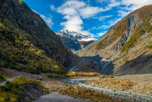 Fox Glacier At New Zealand. High Mountains In Valleys And Glaciers In The Morning With Beautiful Skies.