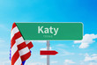 Katy – Texas. Road or Town Sign. Flag of the united states. Blue Sky. Red arrow shows the direction in the city. 3d rendering