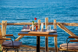 Fototapeta  - Dinner - romantic - Beach - Ocean - Meer - Tisch