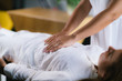 © Microgen - Reiki Healing Treatment with Woman