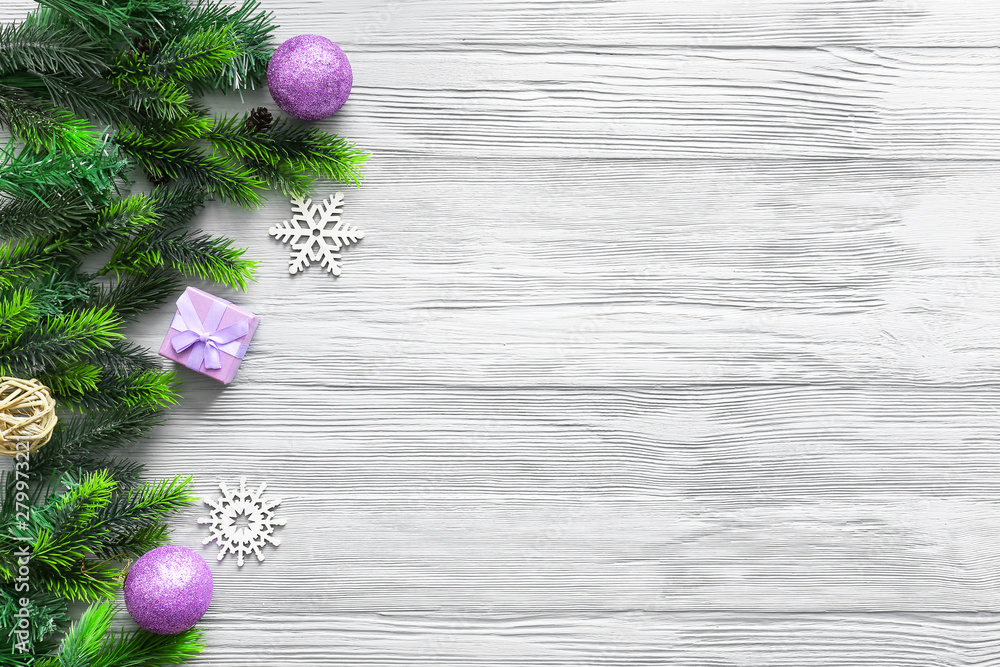 Beautiful Christmas composition on light wooden background